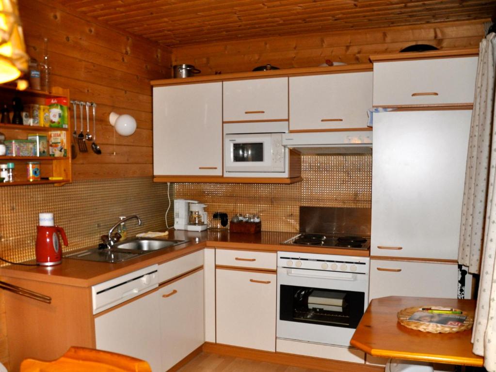Kuchyň nebo kuchyňský kout v ubytování Chalet Edelweiss