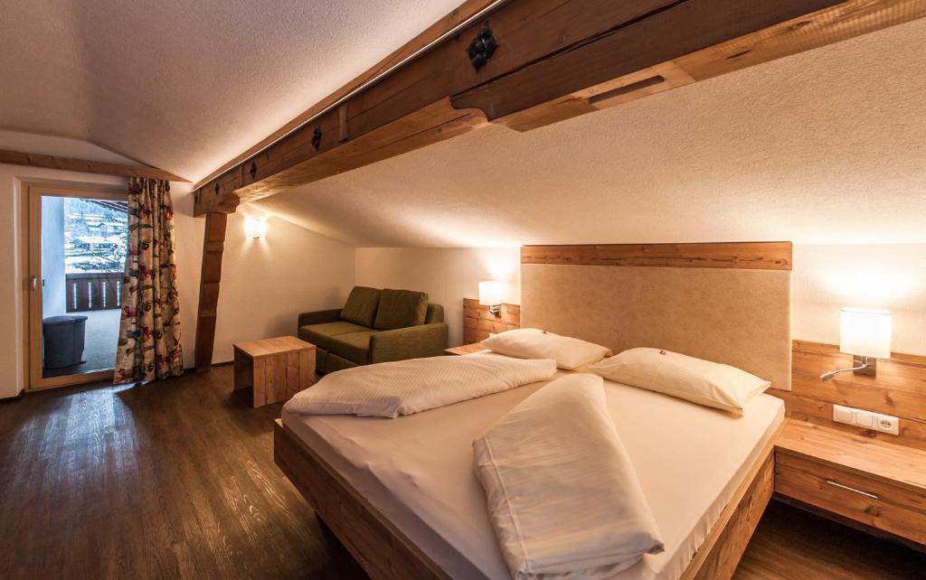 Postel nebo postele na pokoji v ubytování Ferienhaus Larinmos