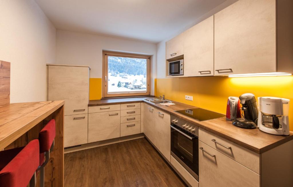 Kuchyň nebo kuchyňský kout v ubytování Ferienhaus Larinmos