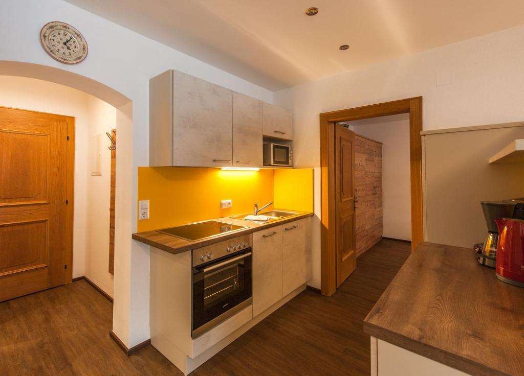 Kuchyň nebo kuchyňský kout v ubytování Ferienhaus Larinmos