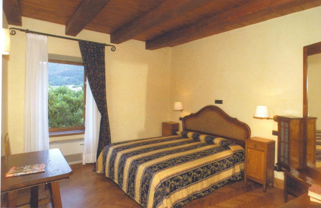 A bed or beds in a room at Villa San Domenico