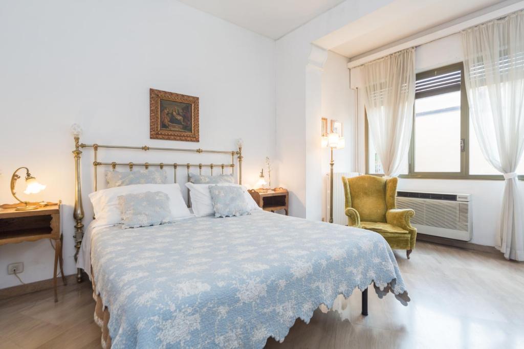 A bed or beds in a room at Cristina Rossi Bed&Breakfast