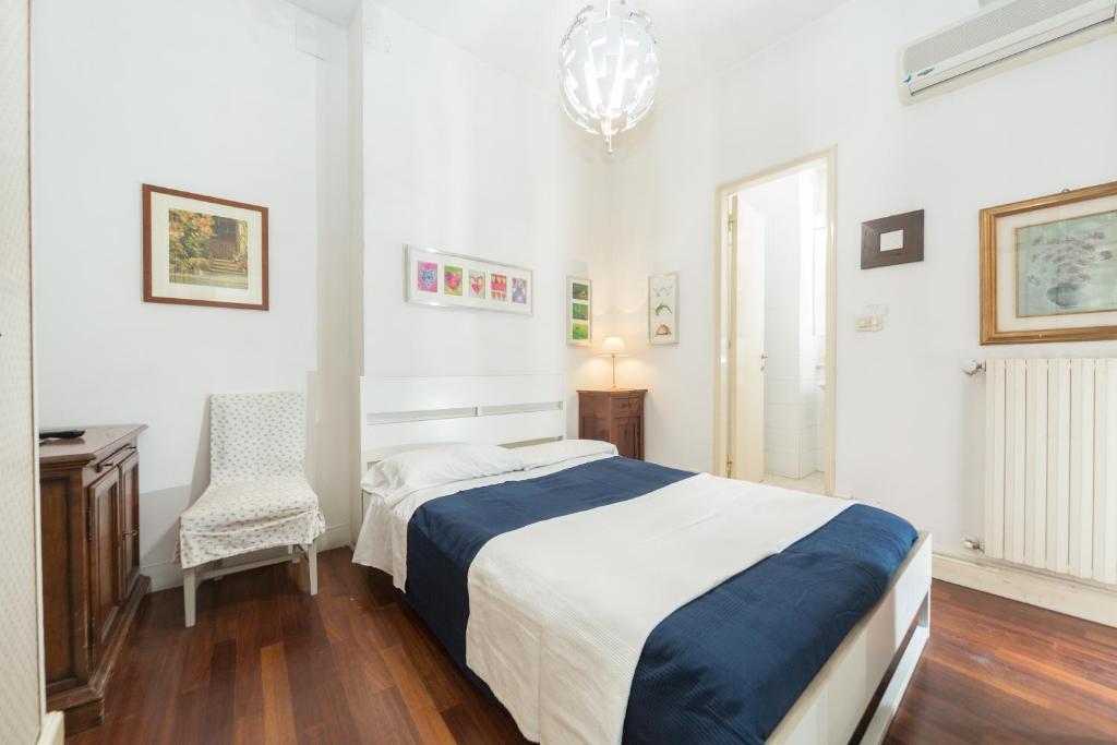 A bed or beds in a room at Cristina Rossi Bed&Breakfast