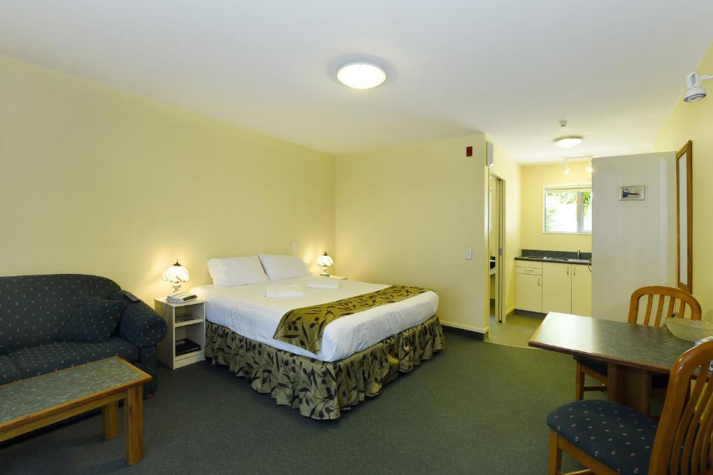 Postel nebo postele na pokoji v ubytování Abelia Motor Lodge