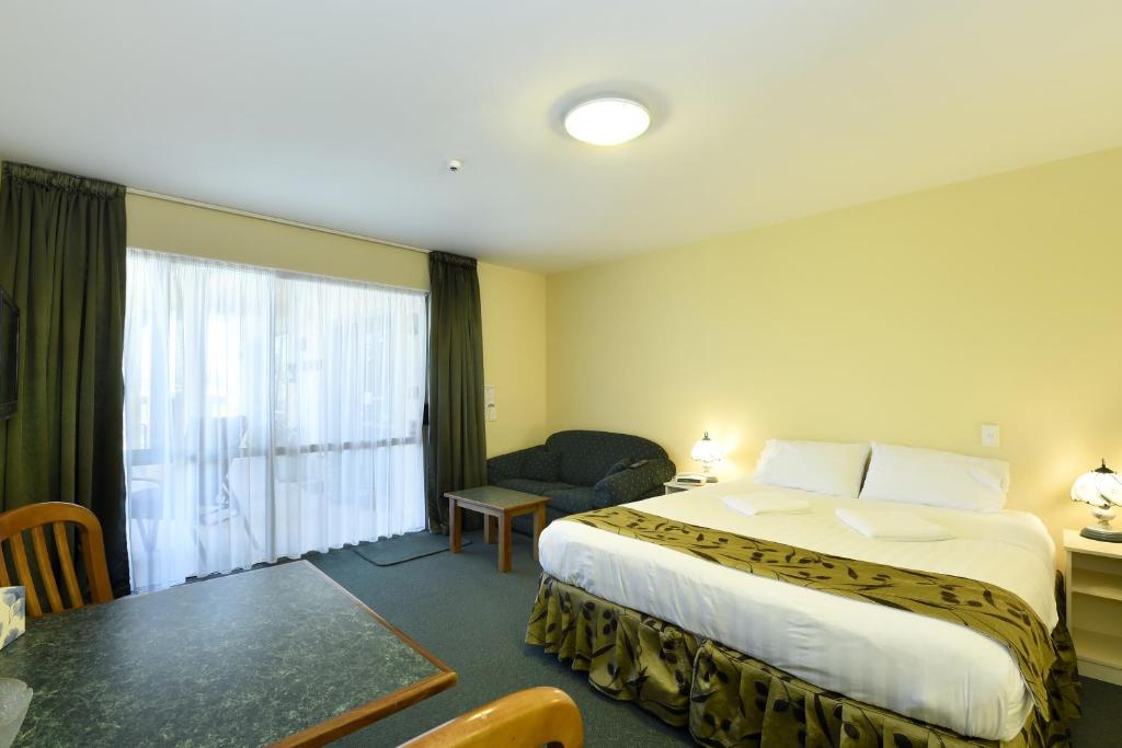 Postel nebo postele na pokoji v ubytování Abelia Motor Lodge