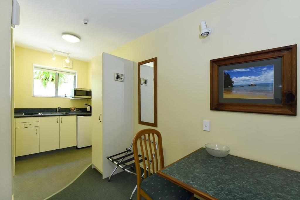 Kuchyň nebo kuchyňský kout v ubytování Abelia Motor Lodge