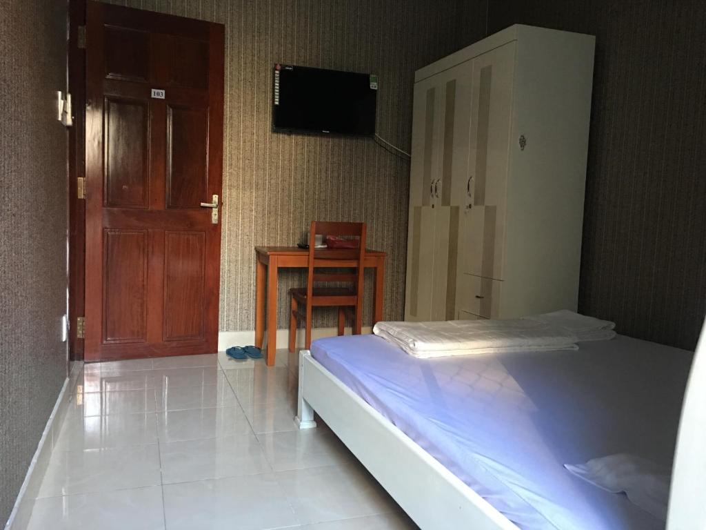 Postel nebo postele na pokoji v ubytování Thu Đô Motel