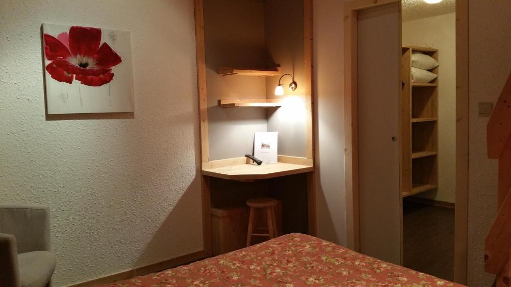 Postel nebo postele na pokoji v ubytování Hotel Les Lans