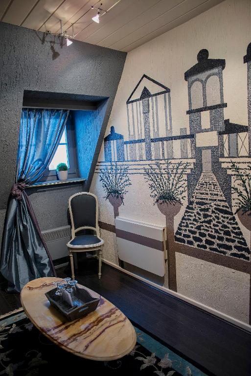 Posezení v ubytování Dépendance Maison Géron