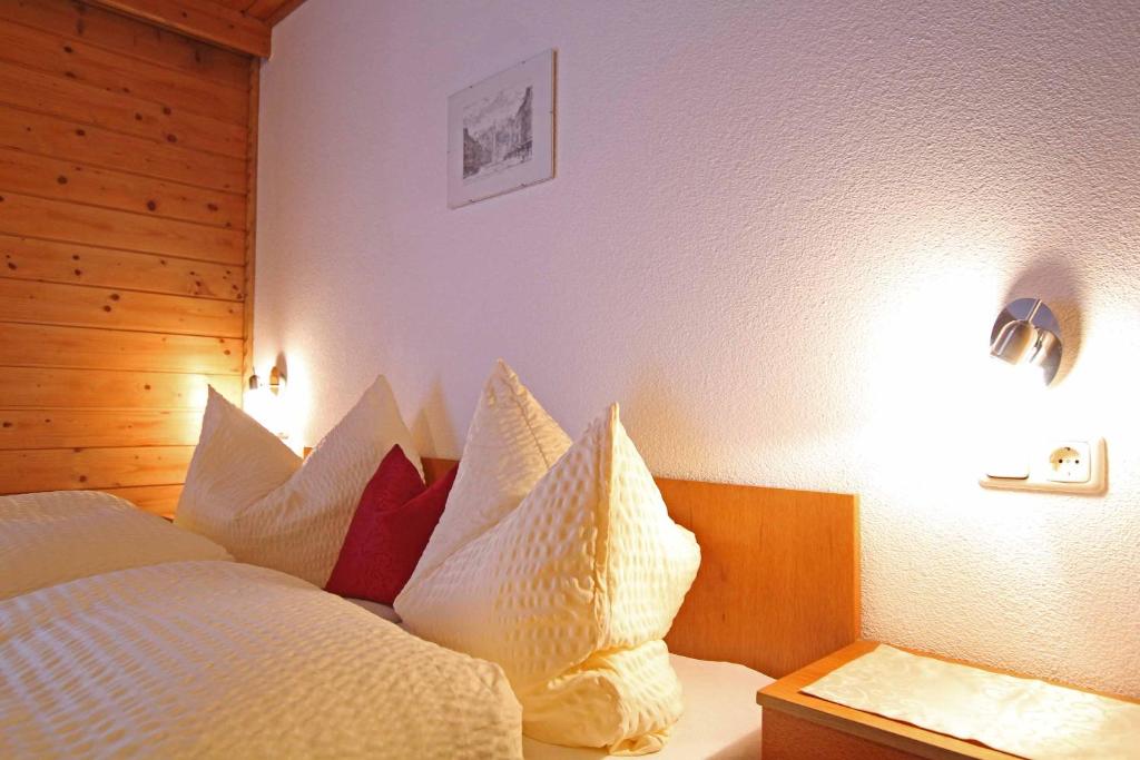 Postel nebo postele na pokoji v ubytování Pension Delacher