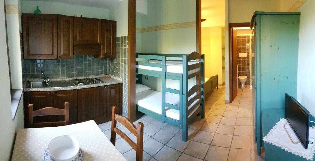 A bed or beds in a room at Residence Costamartino