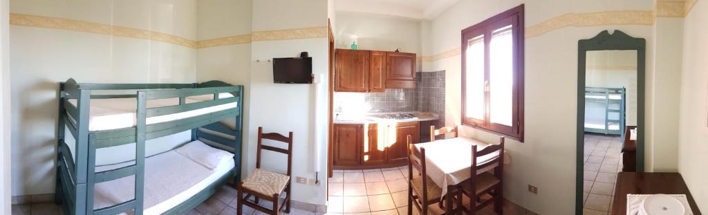 A bed or beds in a room at Residence Costamartino
