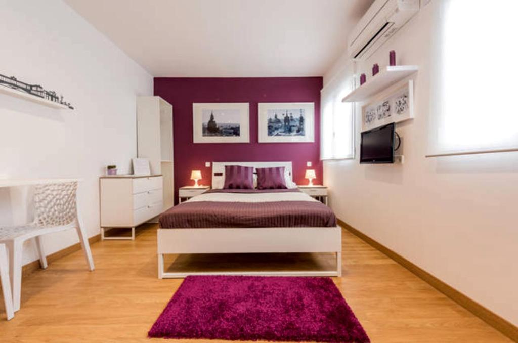 Postel nebo postele na pokoji v ubytování Apartamento en Calle Jardines - Madrid Centro