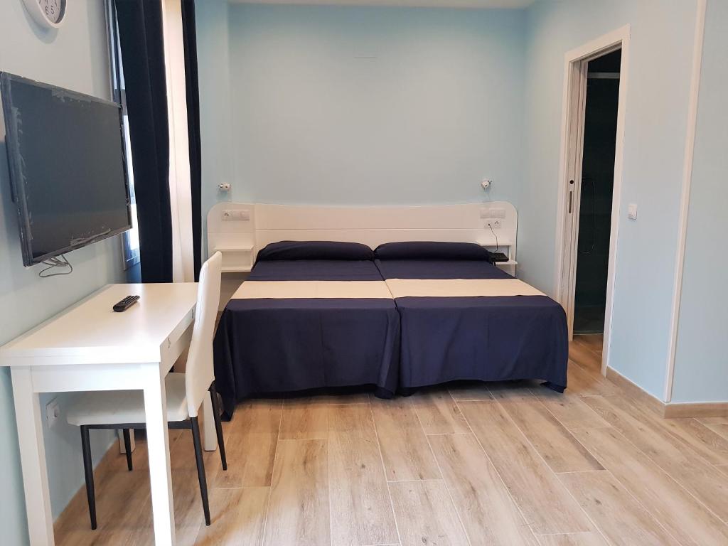 Cama o camas de una habitación en Avenida De America Tijcal