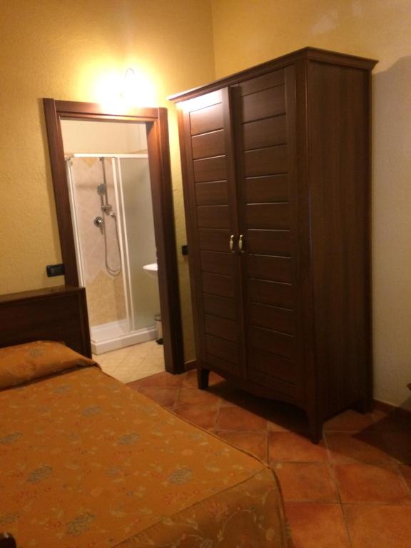 Postel nebo postele na pokoji v ubytování Hotel Cà Fiore