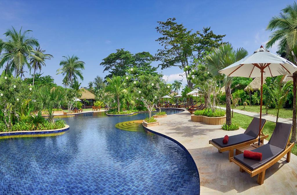 Der Swimmingpool an oder in der Nähe von Mali Resort Sunrise Beach