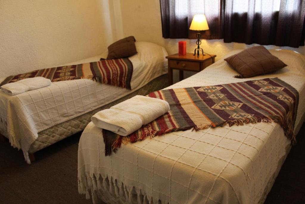 Postel nebo postele na pokoji v ubytování Hospedaje Lo de Max