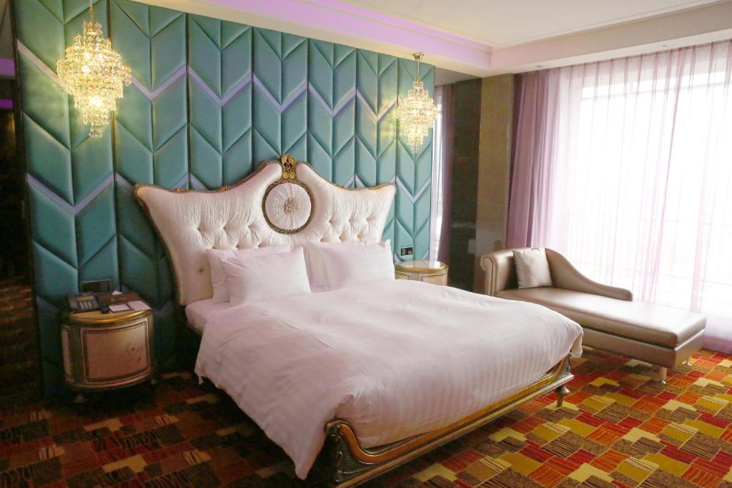 Postelja oz. postelje v sobi nastanitve Sun Hao International Hotel
