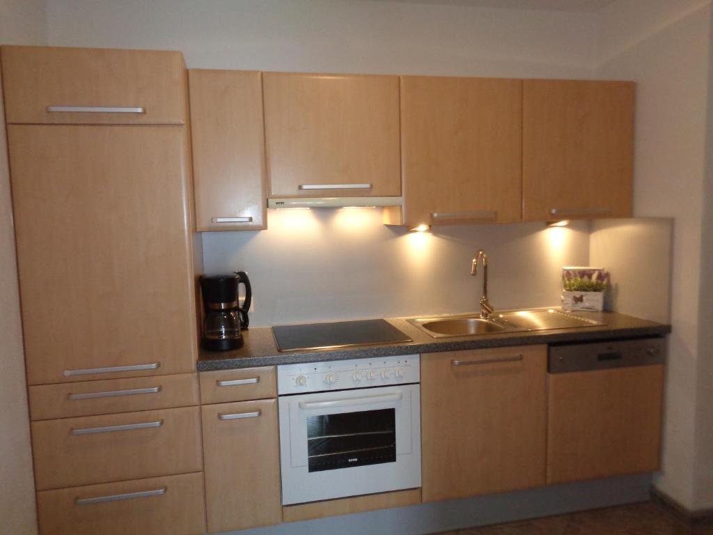 Kuchyň nebo kuchyňský kout v ubytování Appartement Auer