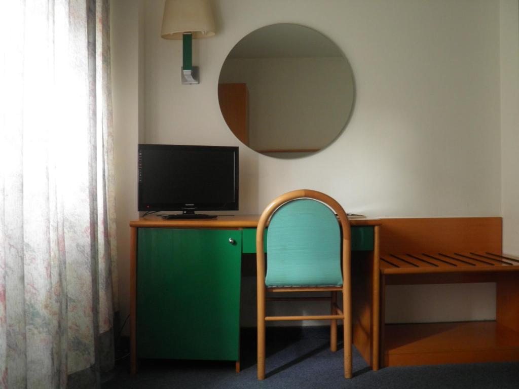 TV a/nebo společenská místnost v ubytování Hotel Ramoverde
