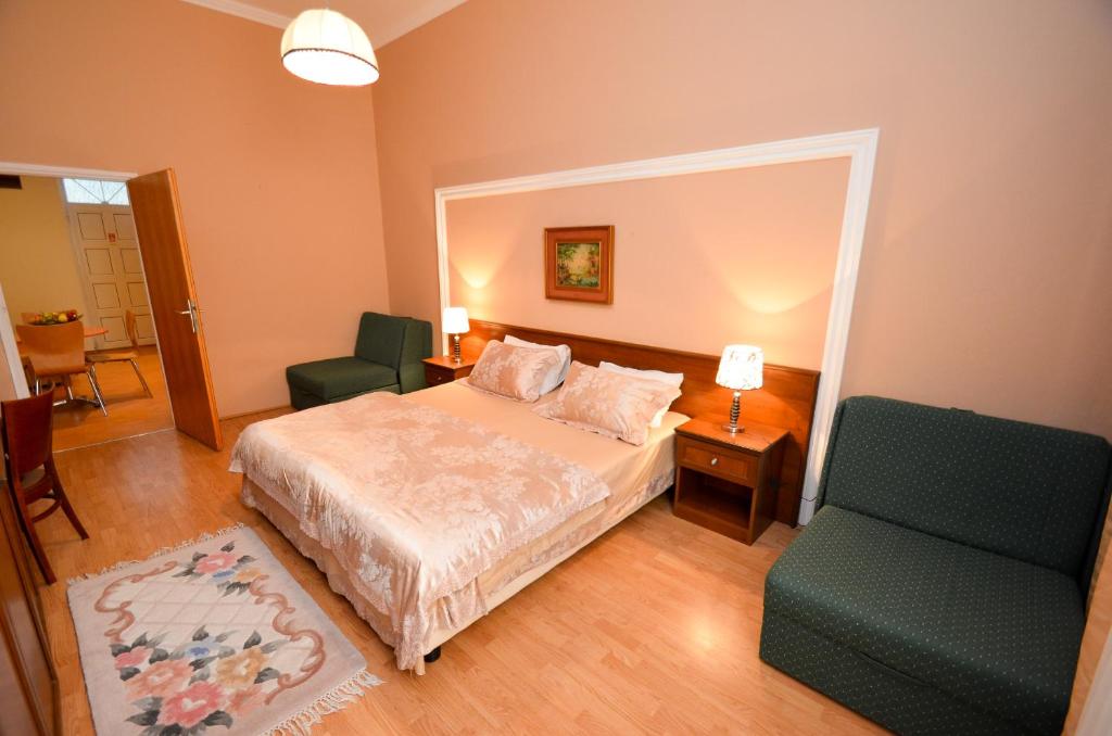 Postel nebo postele na pokoji v ubytování Apartments Vojin