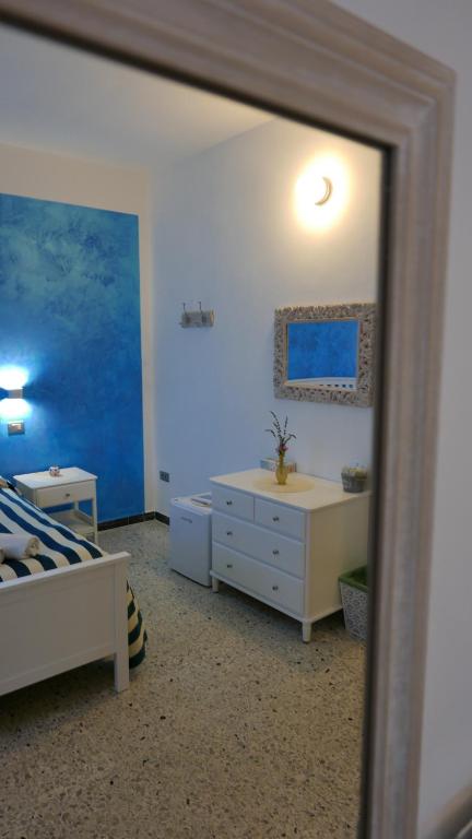 Postel nebo postele na pokoji v ubytování Levante Blu