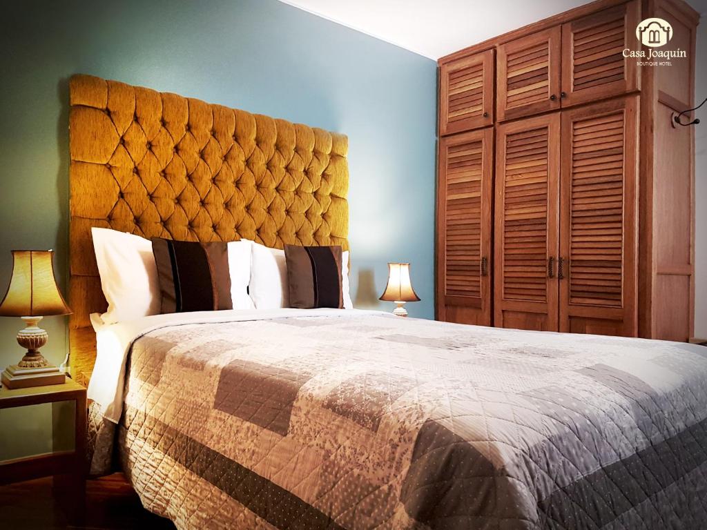 Postel nebo postele na pokoji v ubytování Casa Joaquin Boutique Hotel