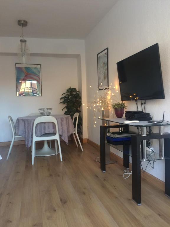 A television and/or entertainment centre at central and beach 3 bedroom apartment perfect location near pyr