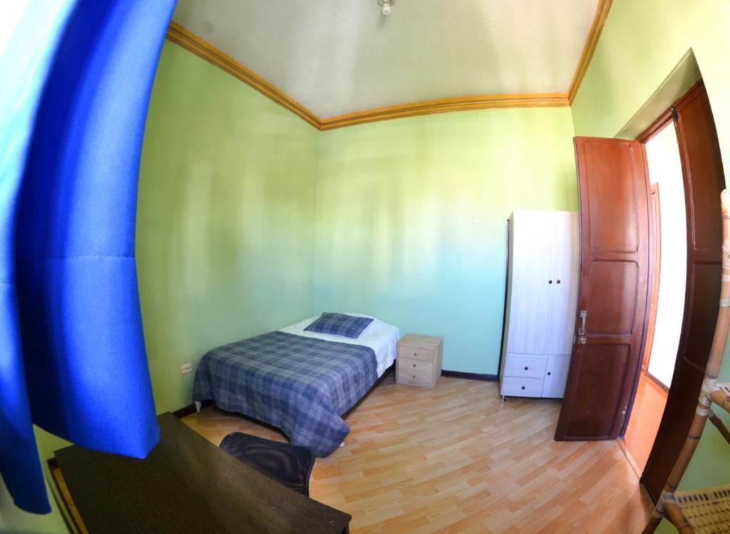 Postel nebo postele na pokoji v ubytování Casa del Sol
