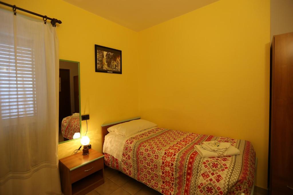 Postel nebo postele na pokoji v ubytování Da Cecilia