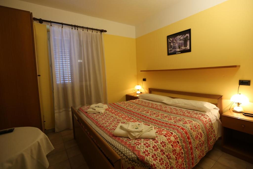 Postel nebo postele na pokoji v ubytování Da Cecilia