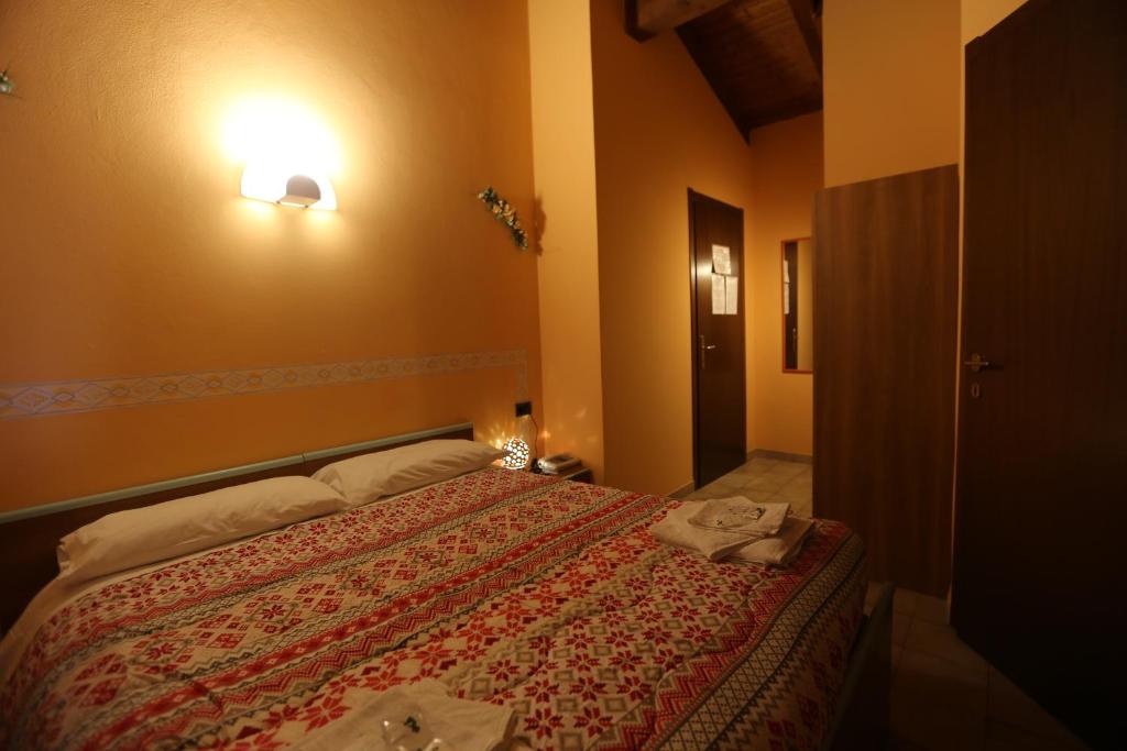 Postel nebo postele na pokoji v ubytování Da Cecilia