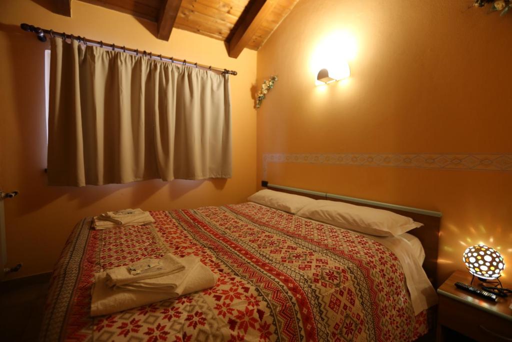 Postel nebo postele na pokoji v ubytování Da Cecilia