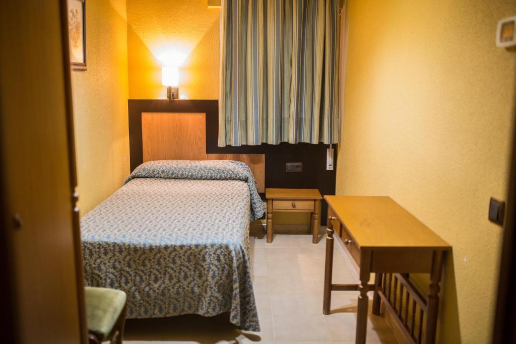 Posteľ alebo postele v izbe v ubytovaní Hostelería La Palmera De Miajadas SL