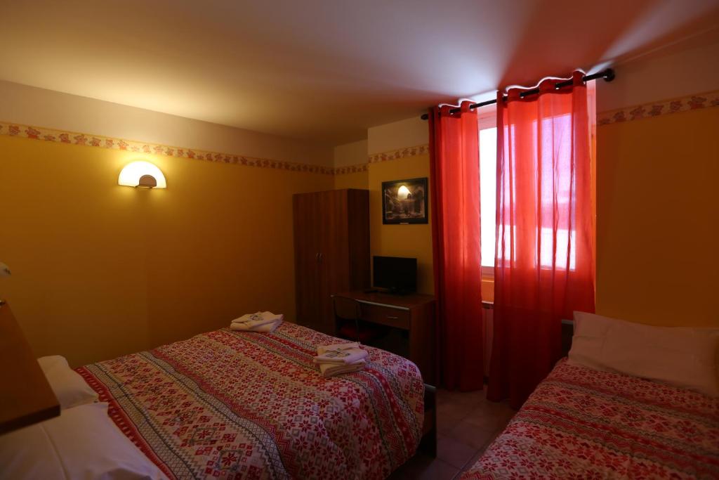 Postel nebo postele na pokoji v ubytování Da Cecilia