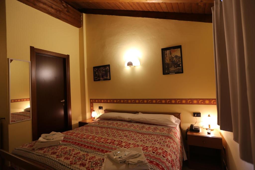 Postel nebo postele na pokoji v ubytování Da Cecilia