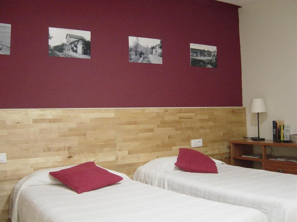 Postel nebo postele na pokoji v ubytování Hostal Can Massot