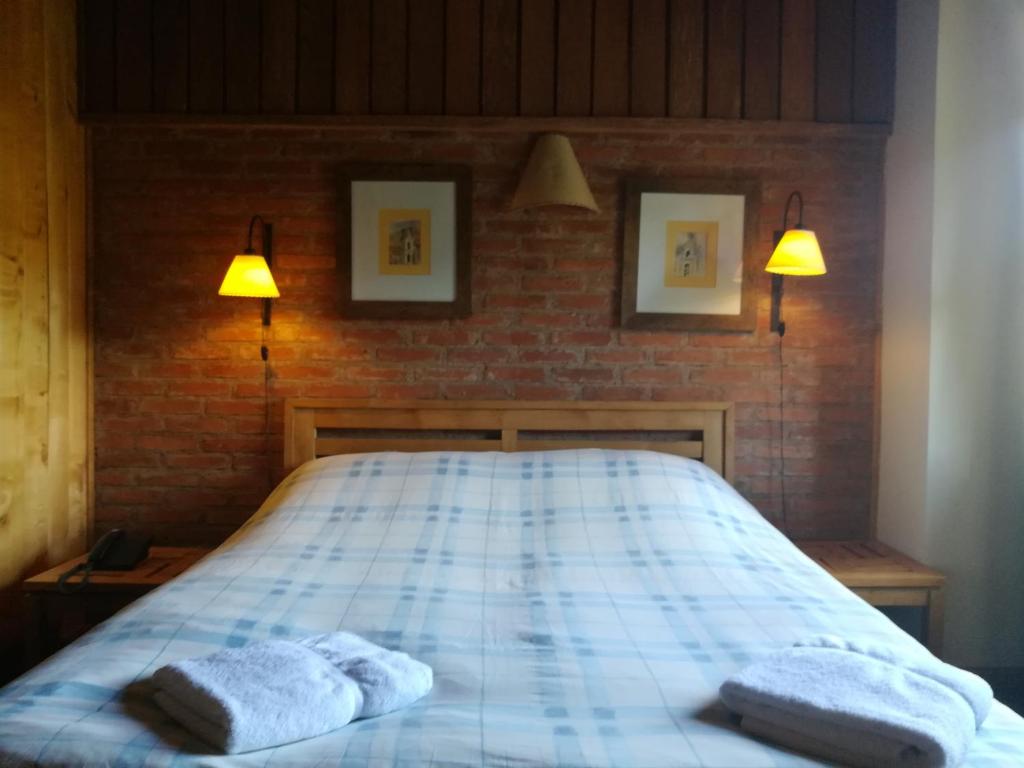 Postel nebo postele na pokoji v ubytování Cabañas La Encantada