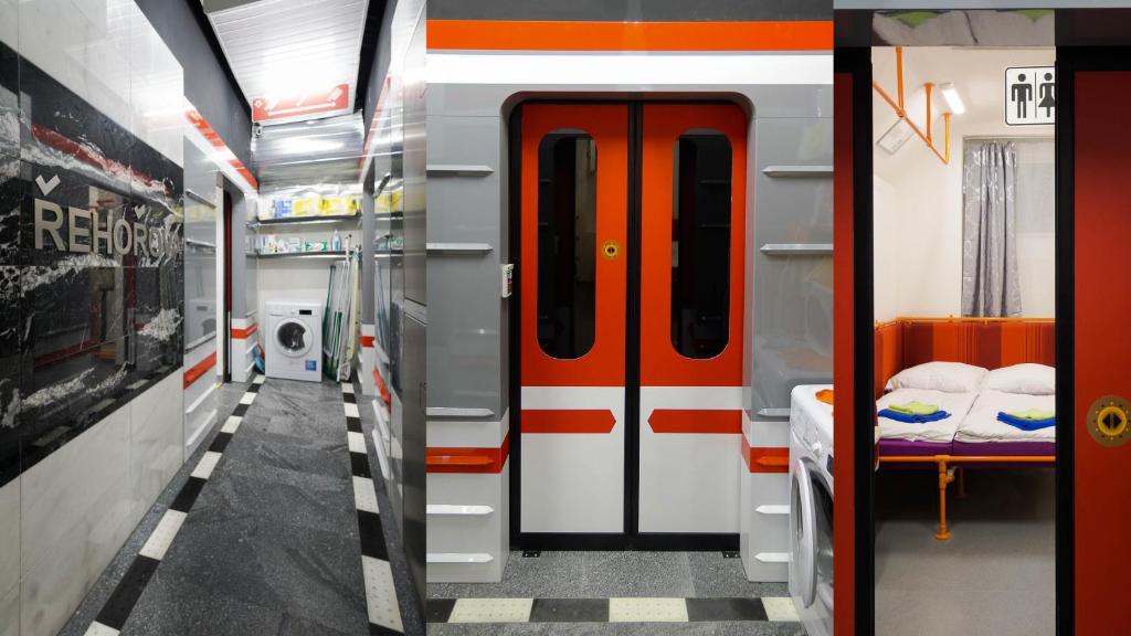 a train car with orange and white doors and a bed at METRO Apartment Prague by Main Train and Bus Station in Prague