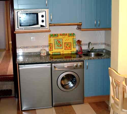 Kuchyň nebo kuchyňský kout v ubytování Apartamentos Villa de Noja
