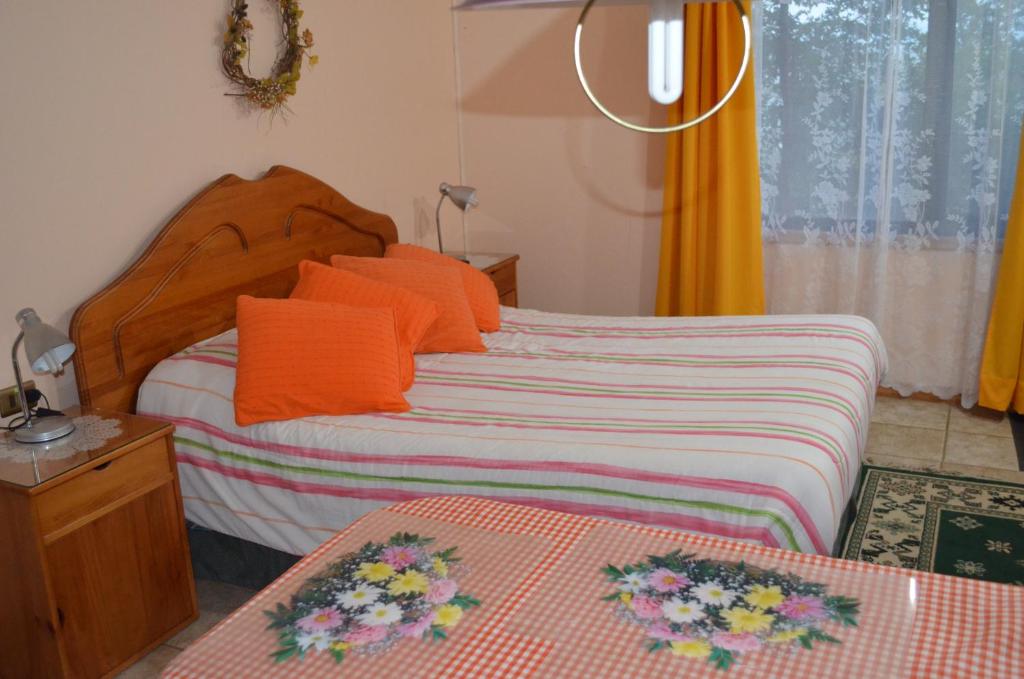 Postel nebo postele na pokoji v ubytování Los Gualles de la Candelaria Apart Hotel