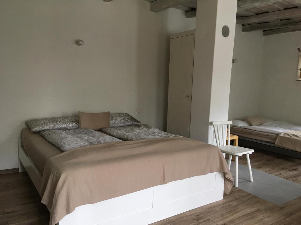 Postel nebo postele na pokoji v ubytování Am Ziegenhof