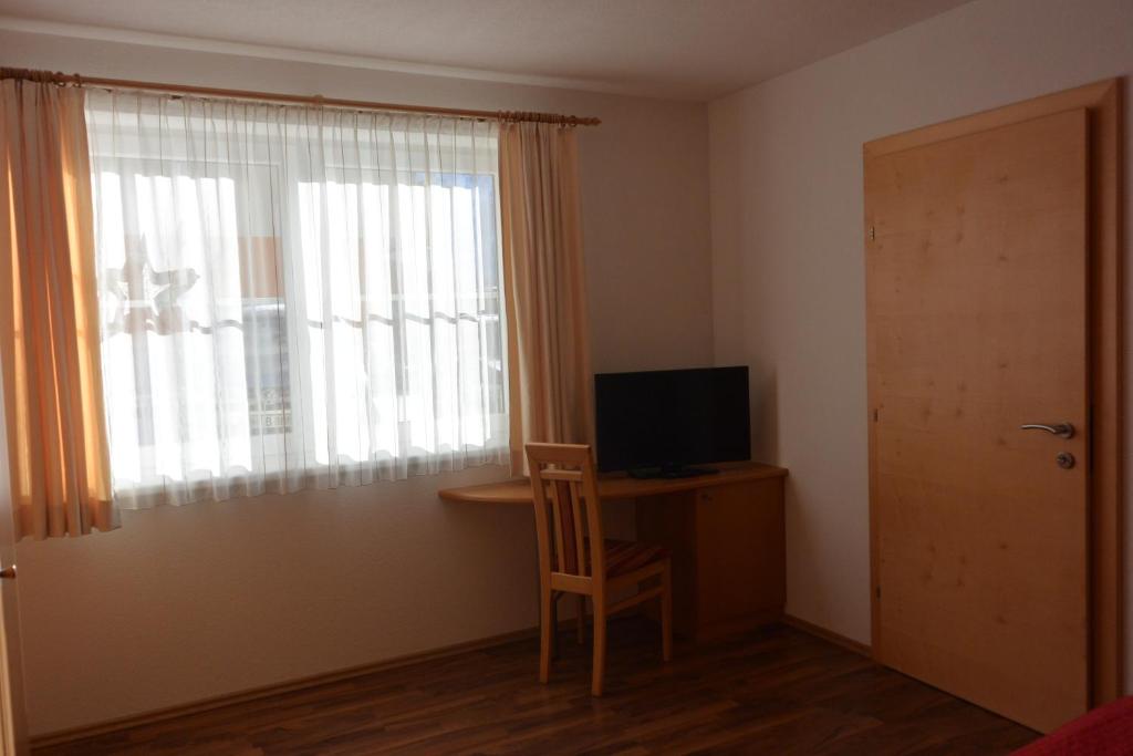 TV a/nebo společenská místnost v ubytování Appartement Auer