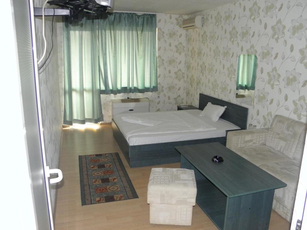 Postel nebo postele na pokoji v ubytování Hotel Pilevski