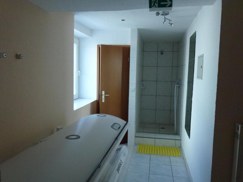 Postel nebo postele na pokoji v ubytování Hotel Wildunger Hof mit Gemeinschaftsküche
