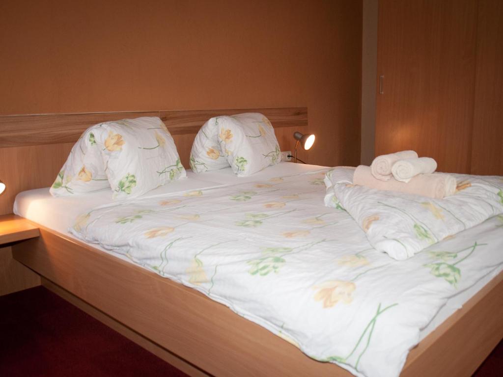 Postel nebo postele na pokoji v ubytování Pension Handle