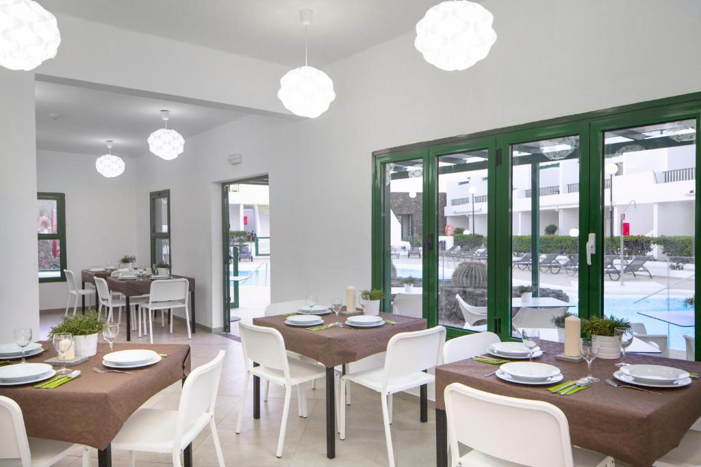 Restaurace v ubytování Apartamentos El Guarapo