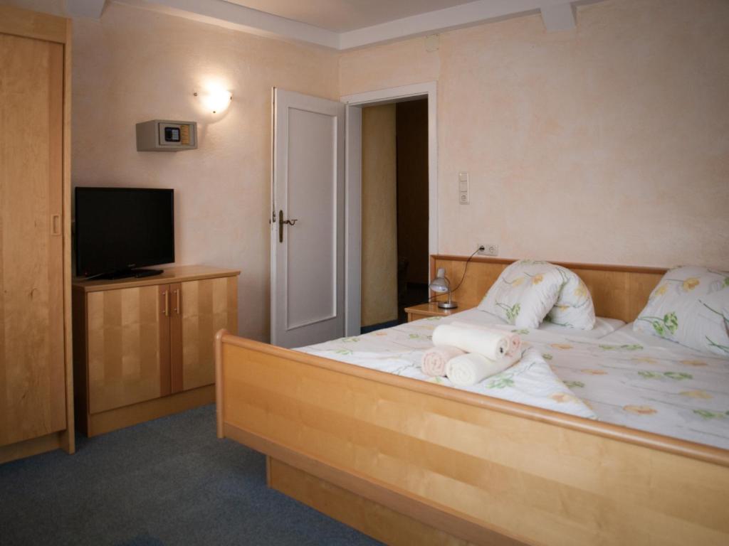 Postel nebo postele na pokoji v ubytování Pension Handle