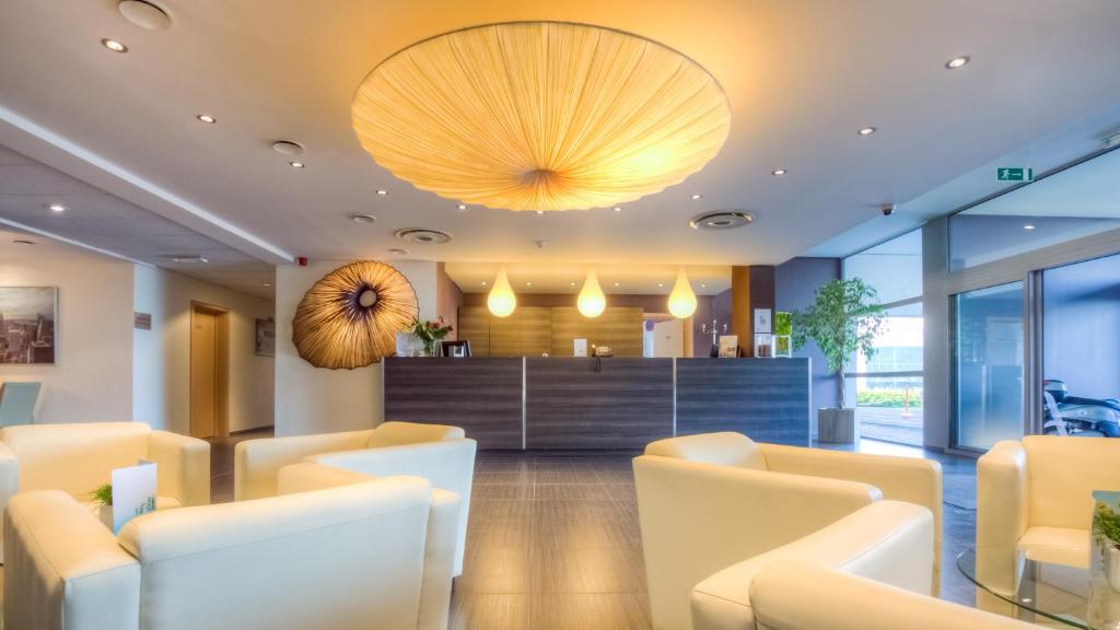 Posezení v ubytování Hotel-Restaurant Horizon Ath-Lessines
