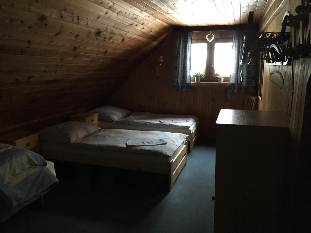 Cama o camas de una habitación en Česká Chalupa